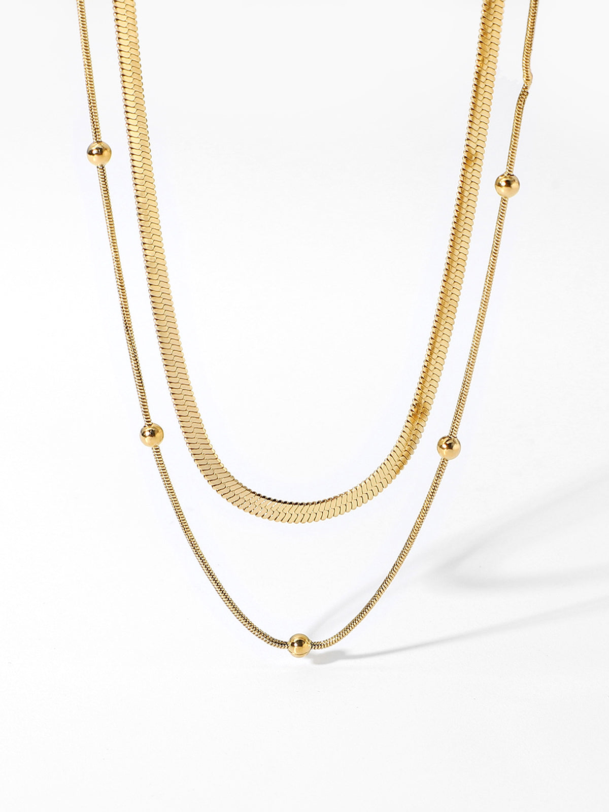Goudkleurige Ketting met Gelaagde Kralen