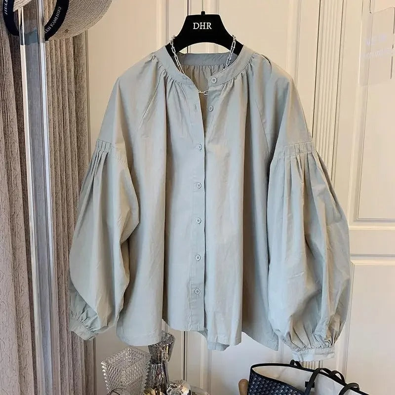 Vrouwelijke Oversized Top met Pofmouwen voor een Retro Look