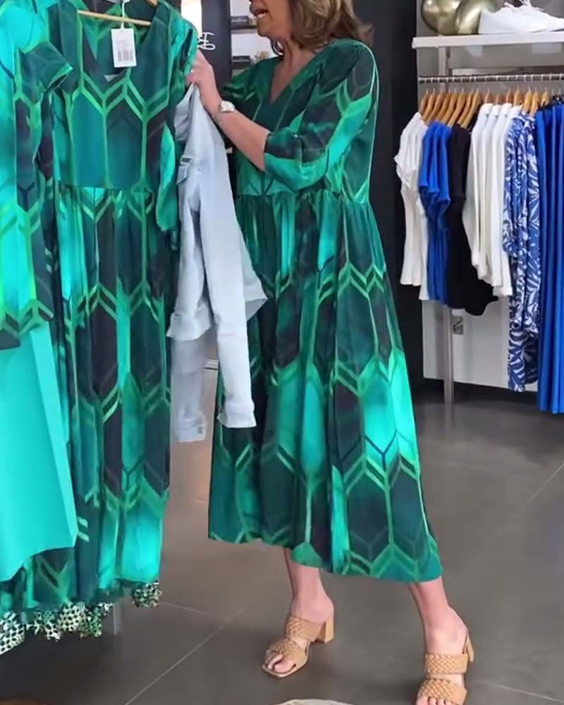 Vrouwelijke Jurk met V-hals Gedrukt Design - StudioMarella