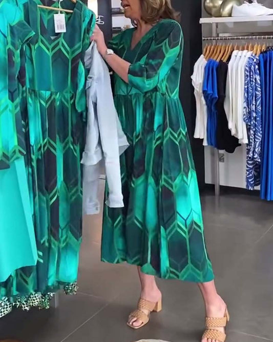 Vrouwelijke Jurk met V-hals en Bloemenprint - StudioMarella
