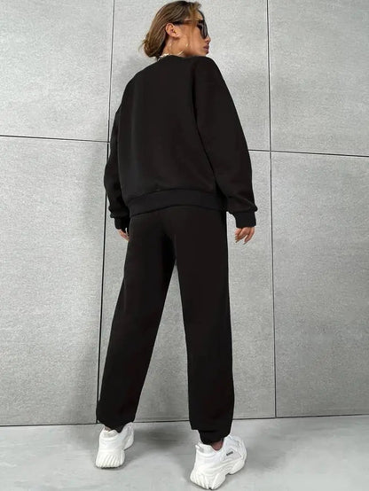 Vrouwelijk Sportpak Set met Trainingsbroek en Sweatshirt