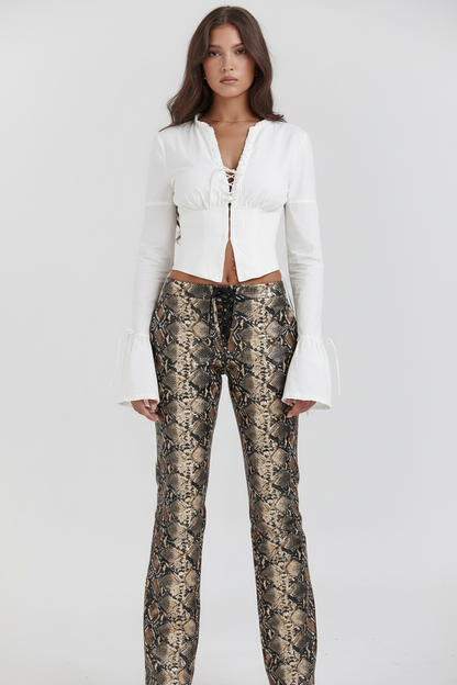 Vrouwelijke Blouse met Vetersluiting en Wijd Model Manchetten
