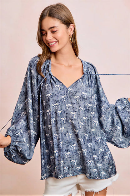 Vrouwelijke Blouse met Strikprint en Striknek Detail