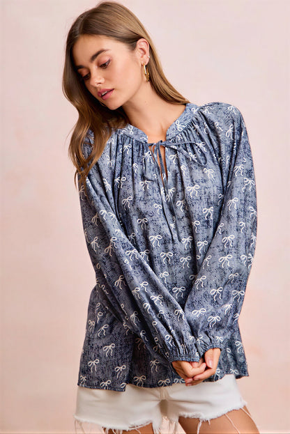 Vrouwelijke Blouse met Strikprint en Striknek Detail