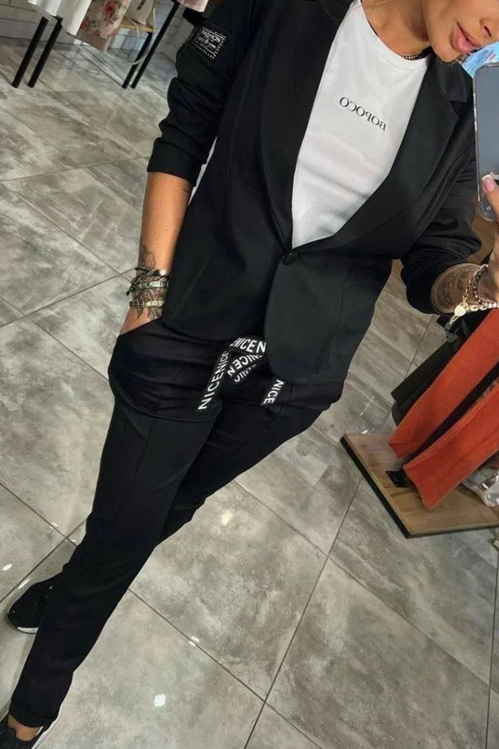 Vrouwelijke Broek en Top Set