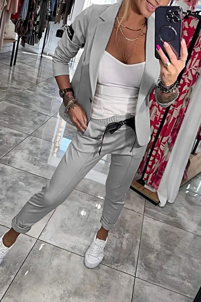 Vrouwelijke Broek en Top Set