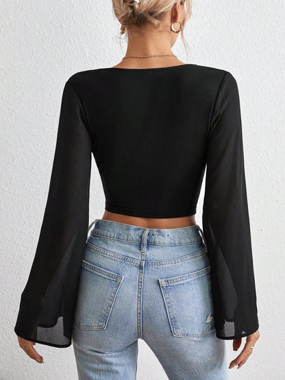 Vrouwelijke Cropped Top losse mouwen diepe V hals