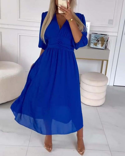 Vrouwelijke Jurk met V-Hals en Taille