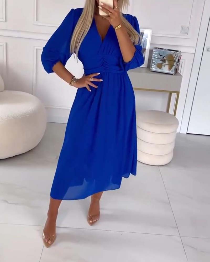Vrouwelijke Jurk met V-Hals en Taille