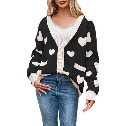 Dames Gebreide Vest met Hartjes en Contrasterende Details wordt 
Dames Vest Gebreid met Hartjes en Kleurrijk Detail