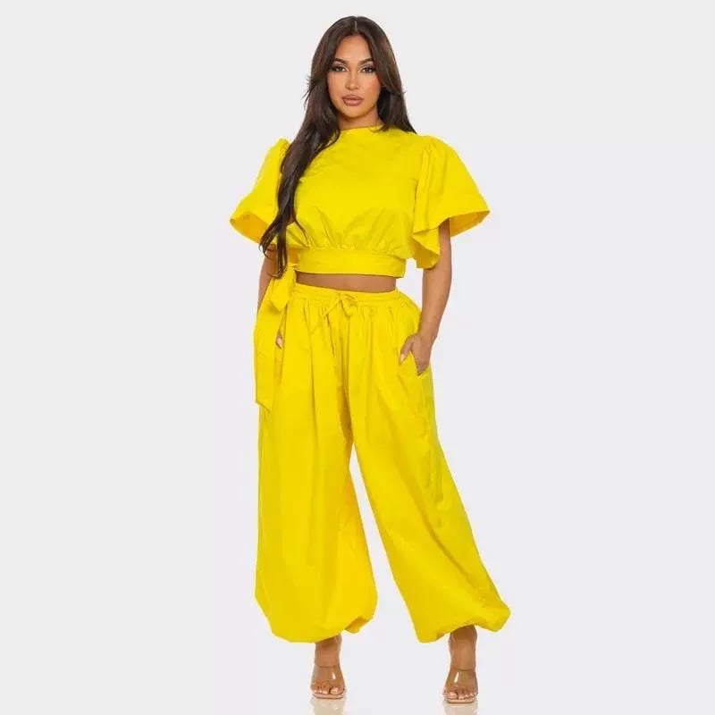 Vrouwelijke Jogger Set met Ruches en Peplum Details Modieus