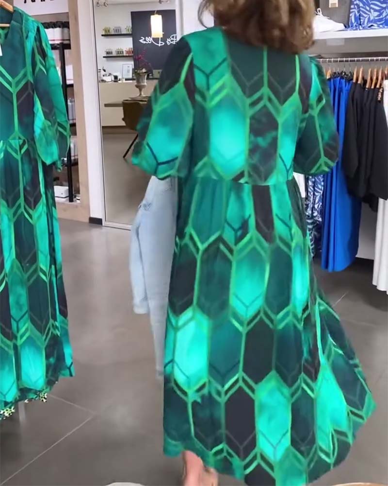 Vrouwelijke Jurk met V-hals Gedrukt Design