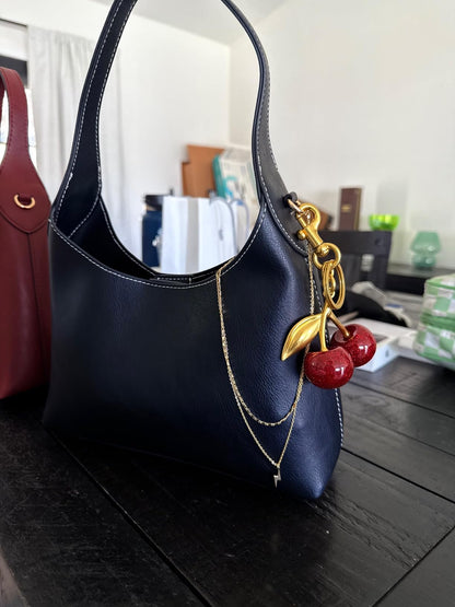 Damentas Zwart met Kersenhanger Stijlvol en Elegent