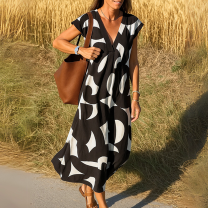 Dames jurk met v-hals elegante pasvorm