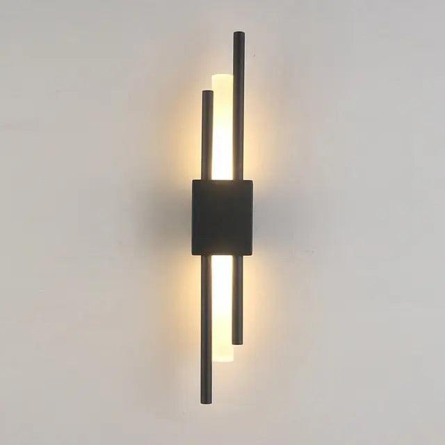 Metalen wandlamp Adan met verstelbare arm in zwart of goud - industrieel design