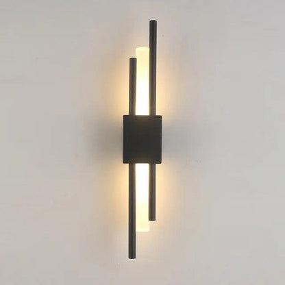Metalen wandlamp Adan met verstelbare arm in zwart of goud - industrieel design