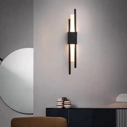 Metalen wandlamp Adan met verstelbare arm in zwart of goud - industrieel design