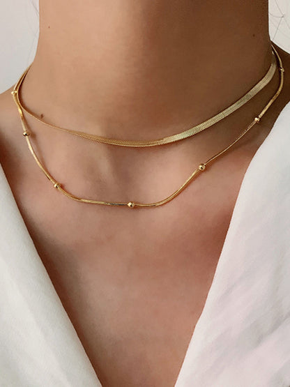 Goudkleurige Ketting met Gelaagde Kralen - StudioMarella
