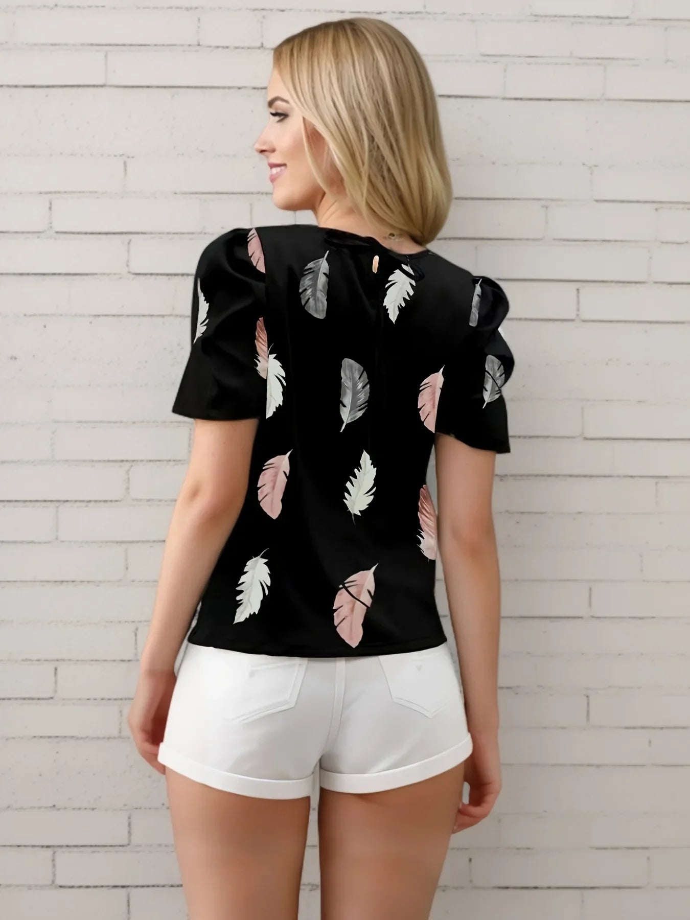 Vrouwelijke Verenprint Bloes Elegant Model