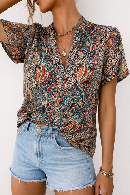 Vrouwelijke Blouse Kort met Plof Mouwen - StudioMarella