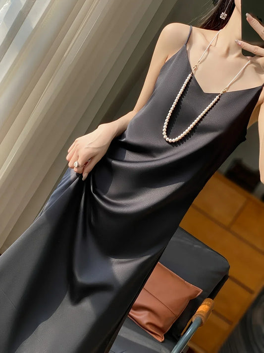 Dames Zomerjurk Maxi Mouwloos Vloeiende Jurk Amara → Dames Maxi Zomerjurk Mouwloos Vloeiend Jurk - StudioMarella