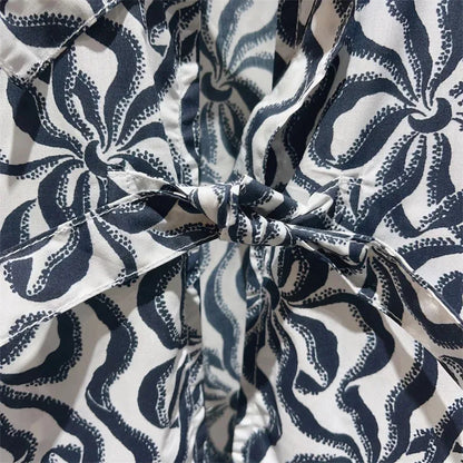 Vrouwelijke Blouse met Bloemenprint en Strik Detail