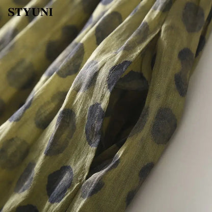 Donkergroene Jurk met Polka Dots en Elastische Taille