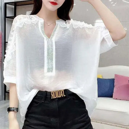 Vrouwelijke Kant Blouse met Glanzende Diamantjes
