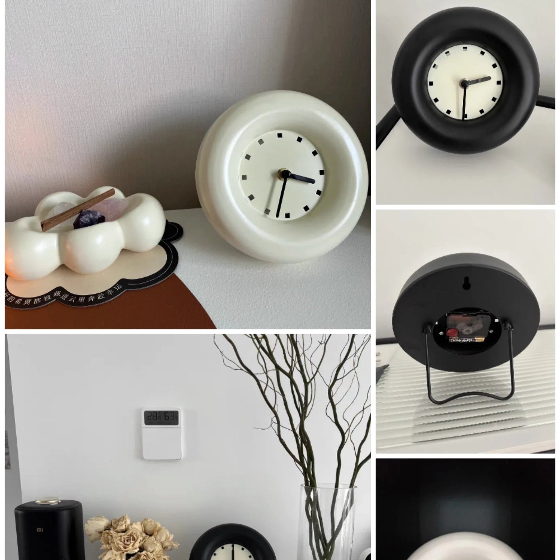  Elekta alarmklok in zwart en wit met een strak, minimalistisch ontwerp. De klok heeft een eenvoudige wijzerplaat met zwarte markeringen en past perfect in een modern interieur. De foto toont verschillende hoeken van de klok, waaronder de achterkant en details van het ontwerp.