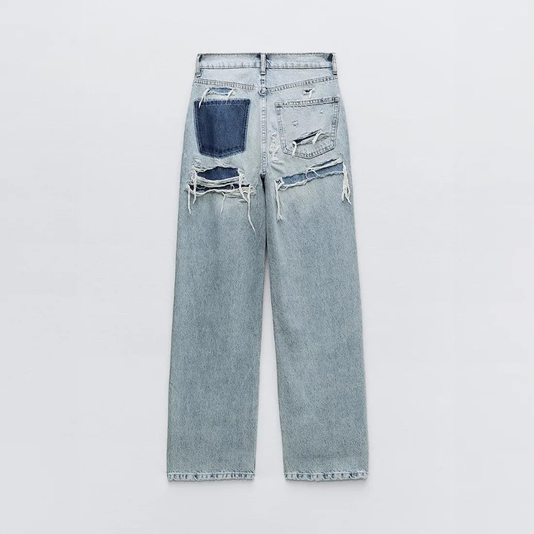 High waist jeans met gescheurde details