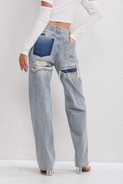 High waist jeans met gescheurde details