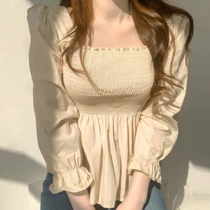 Elegante Witte Blouse voor Dames met Vrouwelijke Stijl