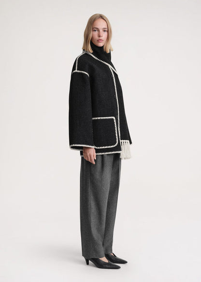Elegante damesjas met sjaal