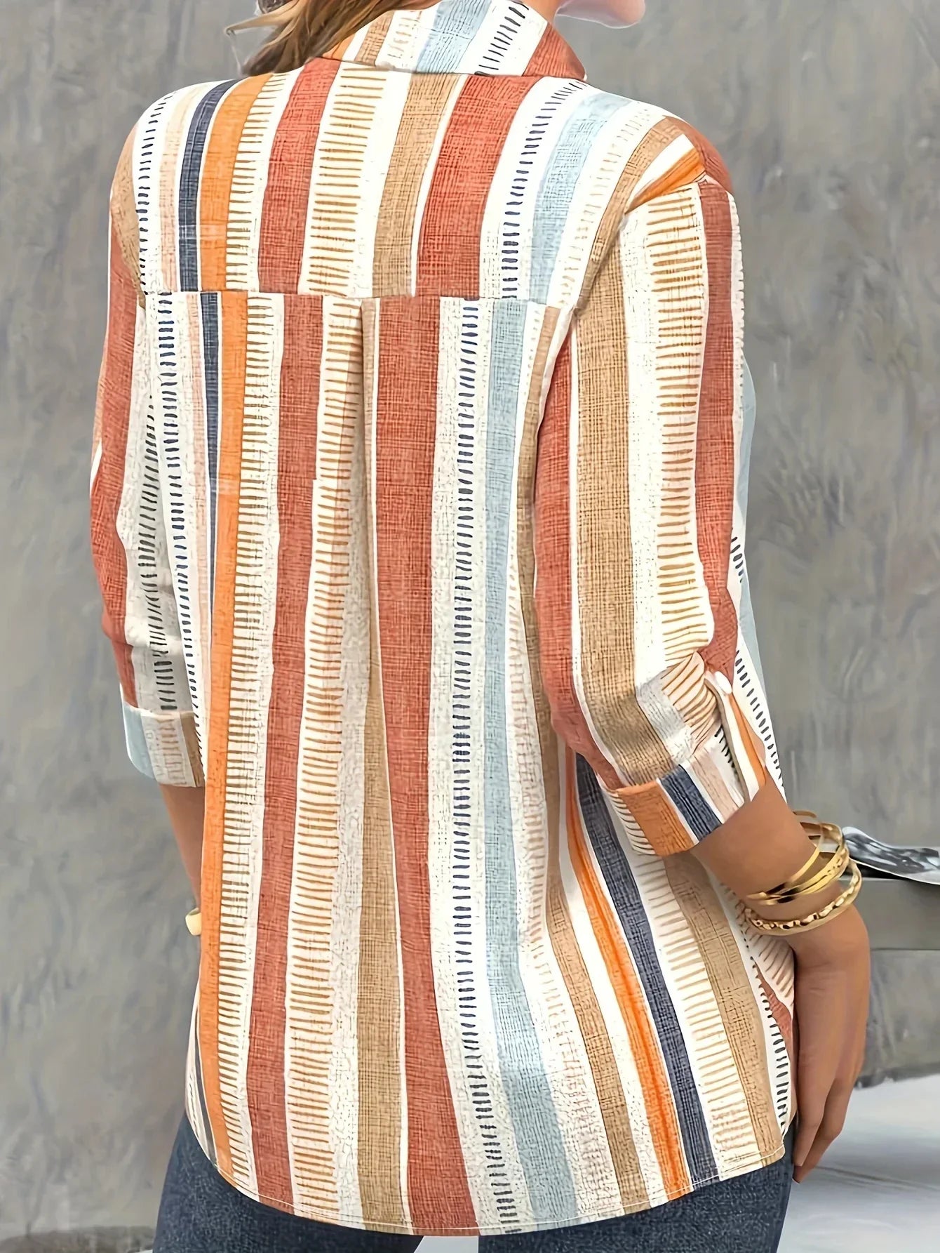 Vrouwelijke Blouse Oranje Met Lange Mouwen en Streepjes
