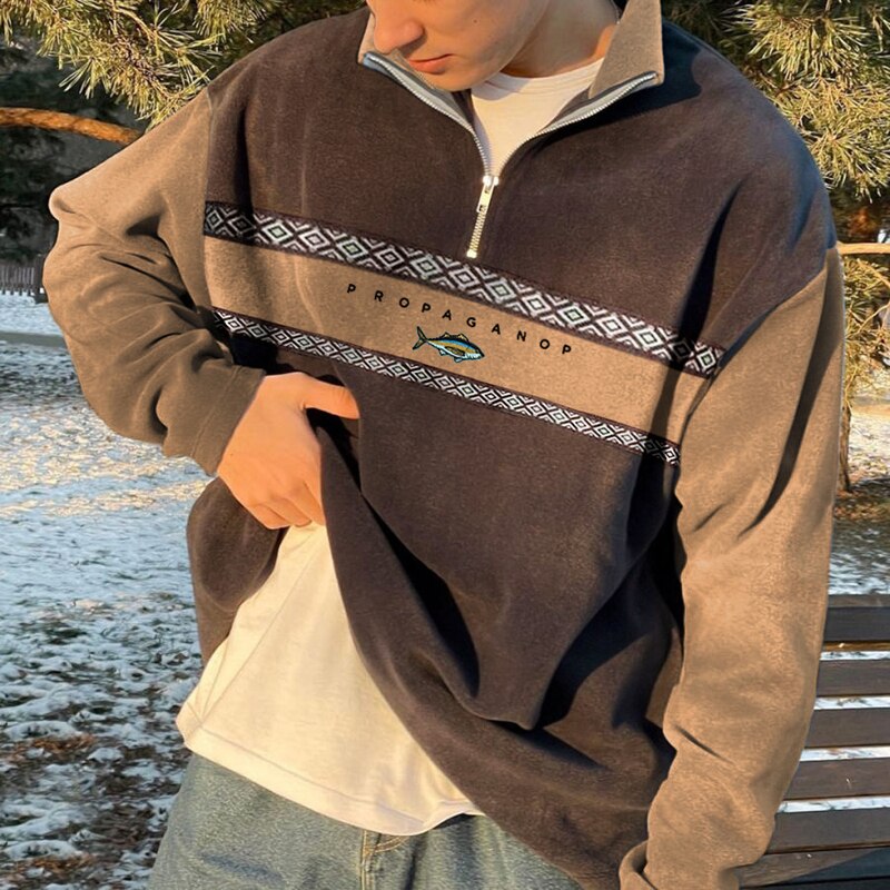 Oversized trui met rits en geometrisch patroon
