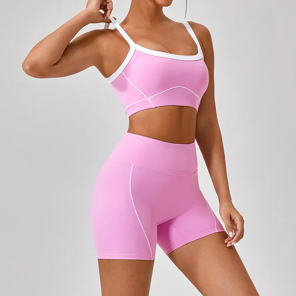 Vrouwelijke Sportieve Broek en Top Set