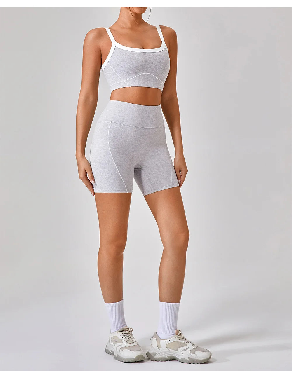 Vrouwelijke Sportieve Broek en Top Set