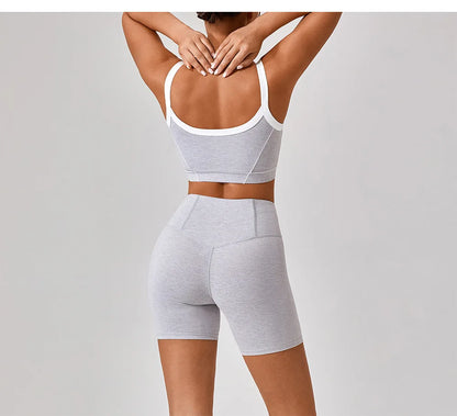 Vrouwelijke Sportieve Broek en Top Set