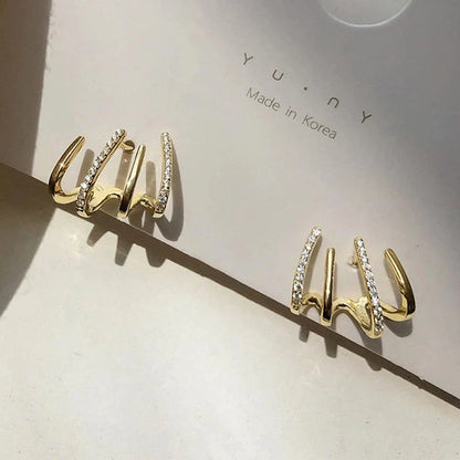 Elegante Oorbellen met Vier Klauwen Design Goud Zilver