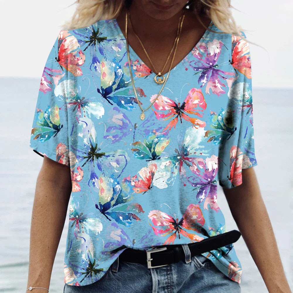 Vrouwelijk Bloemen Shirt met Kleurrijke Vlinder Print - StudioMarella