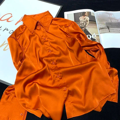 Dames Satijnen Blouse Oranje met Lange Mouwen