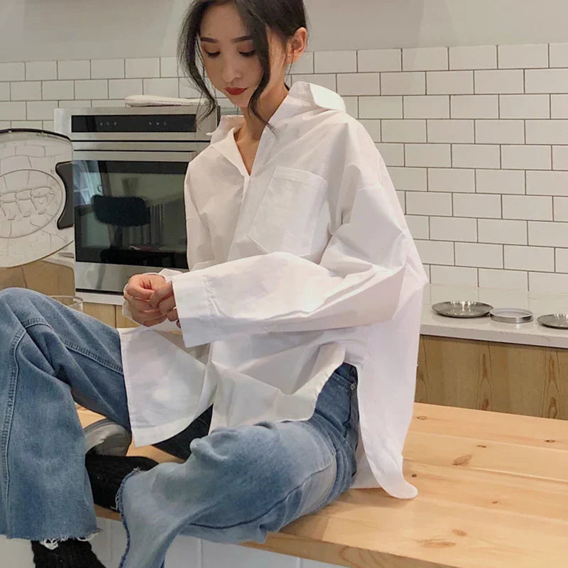 Vrouwelijke Oversized Blouse met Kraag en Lange Mouwen