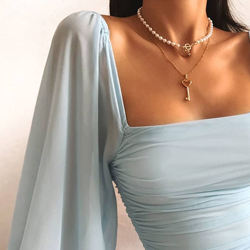 Korte Lichtblauwe Jurk met Pofmouwen Bodycon