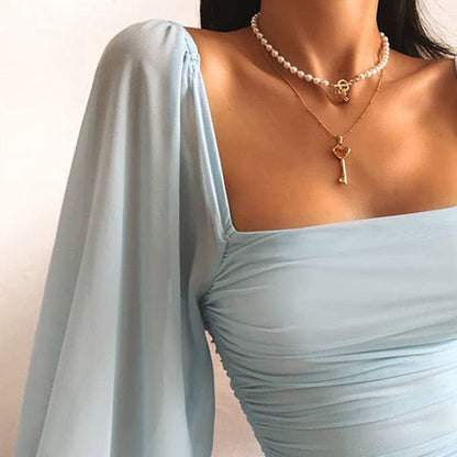 Korte Lichtblauwe Jurk met Pofmouwen Bodycon