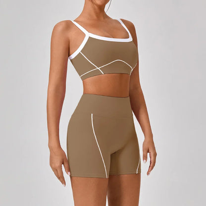 Vrouwelijke Sportieve Broek en Top Set