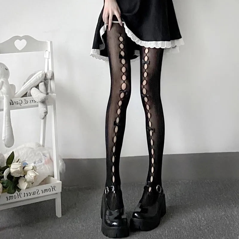 Collant met strikdetails tot aan de dij