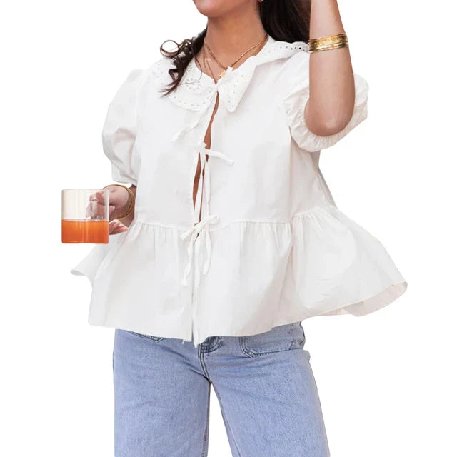 Vrouwelijke Top met Strik en Peplum Detail - StudioMarella