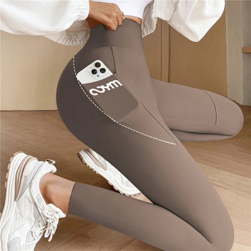Sportleggings Hoge Taille Elastisch Met Zijzakken → Sportleggings Hoge Taille Elastisch Zijzakken Joggingbroek