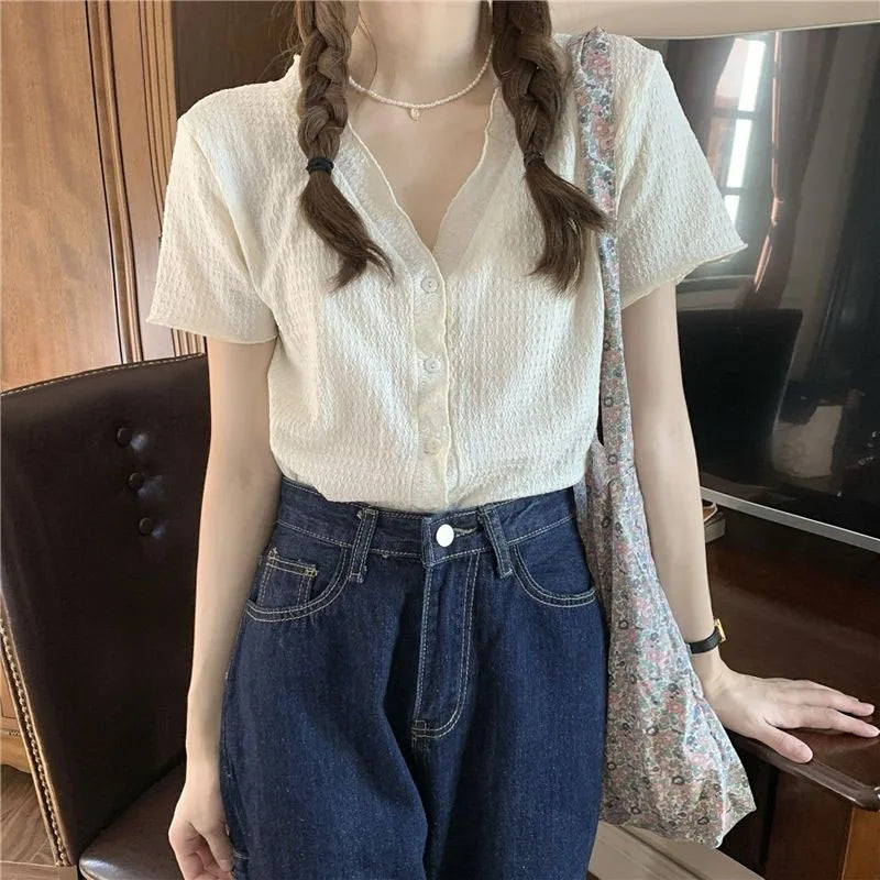 V-hals Blouse Zomerse Knopen Ontwerp - StudioMarella