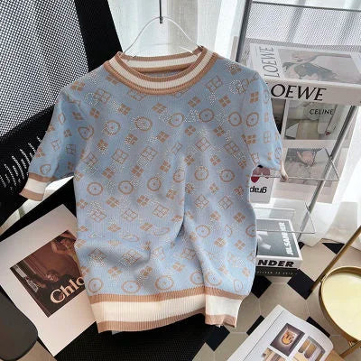 Gebreide Top met Gouden Detail en Ruches